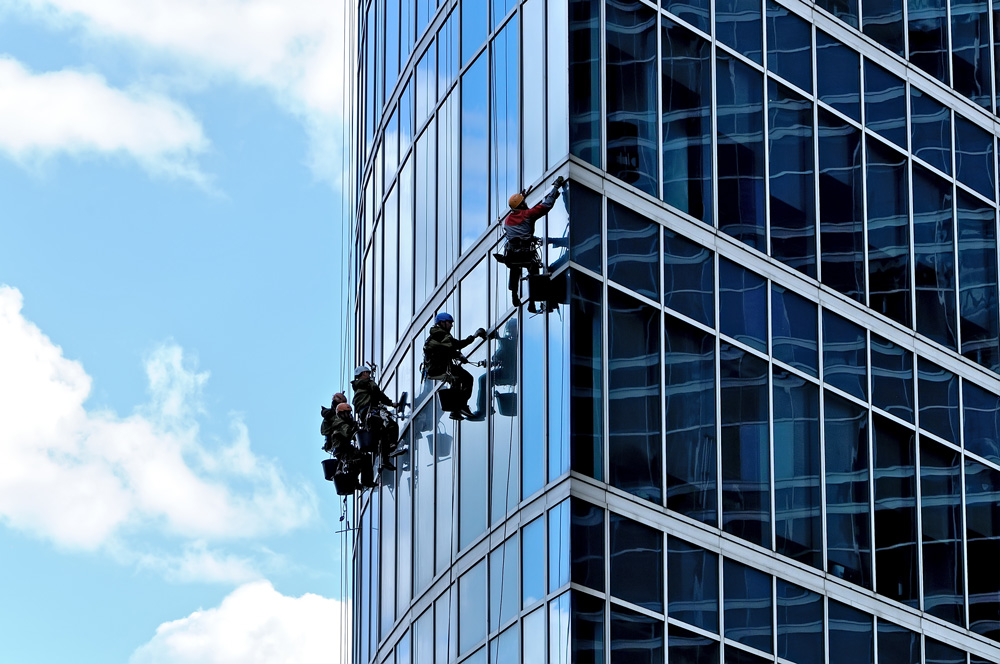 Abseiling cleaning being done on skyscraper